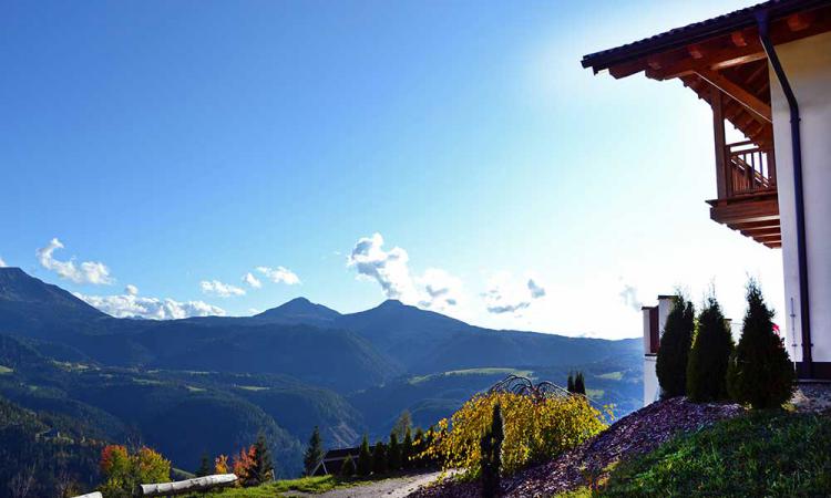 Panoramic view tot he Dolomites from the mountain farm Samer